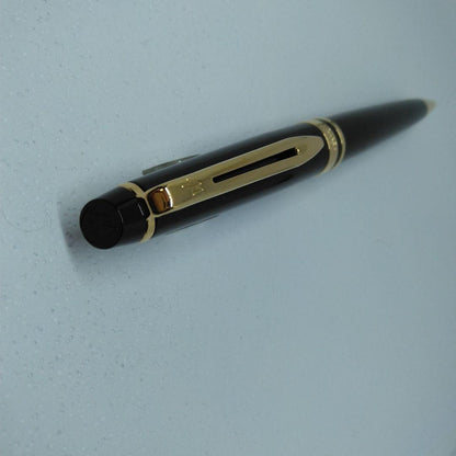 Waterman Expert Black GTBP ballpoint pen with metal black body and gold accents shown with dedicated case