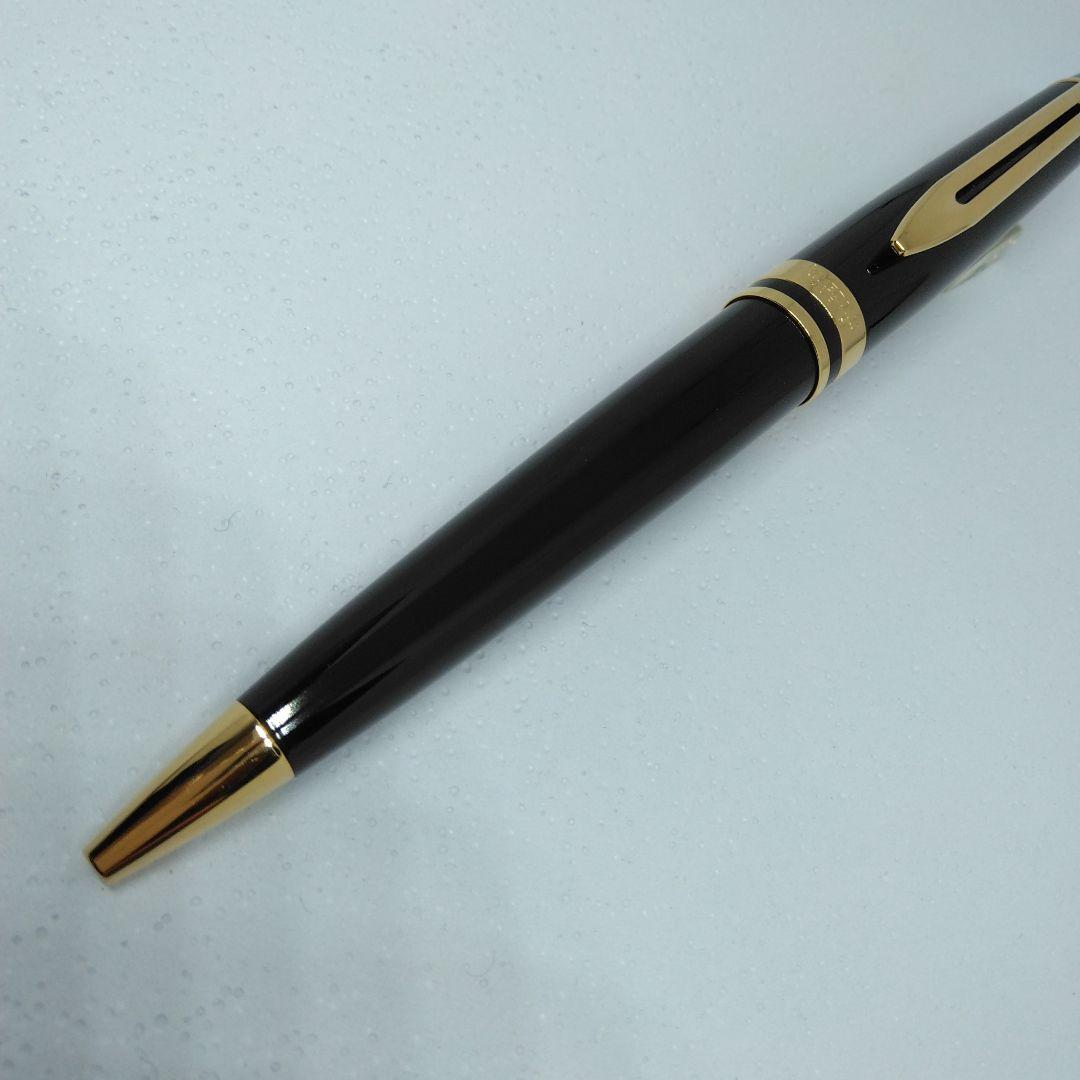 Waterman Expert Black GTBP ballpoint pen with metal black body and gold accents shown with dedicated case