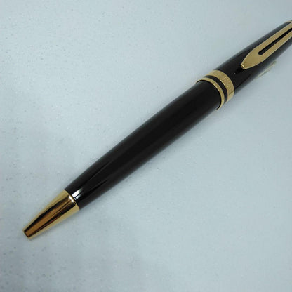 Waterman Expert Black GTBP ballpoint pen with metal black body and gold accents shown with dedicated case