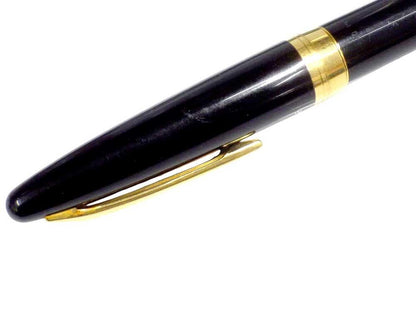 Pilot fountain pen with 18K gold nib and black metal body, decorated with gold accents