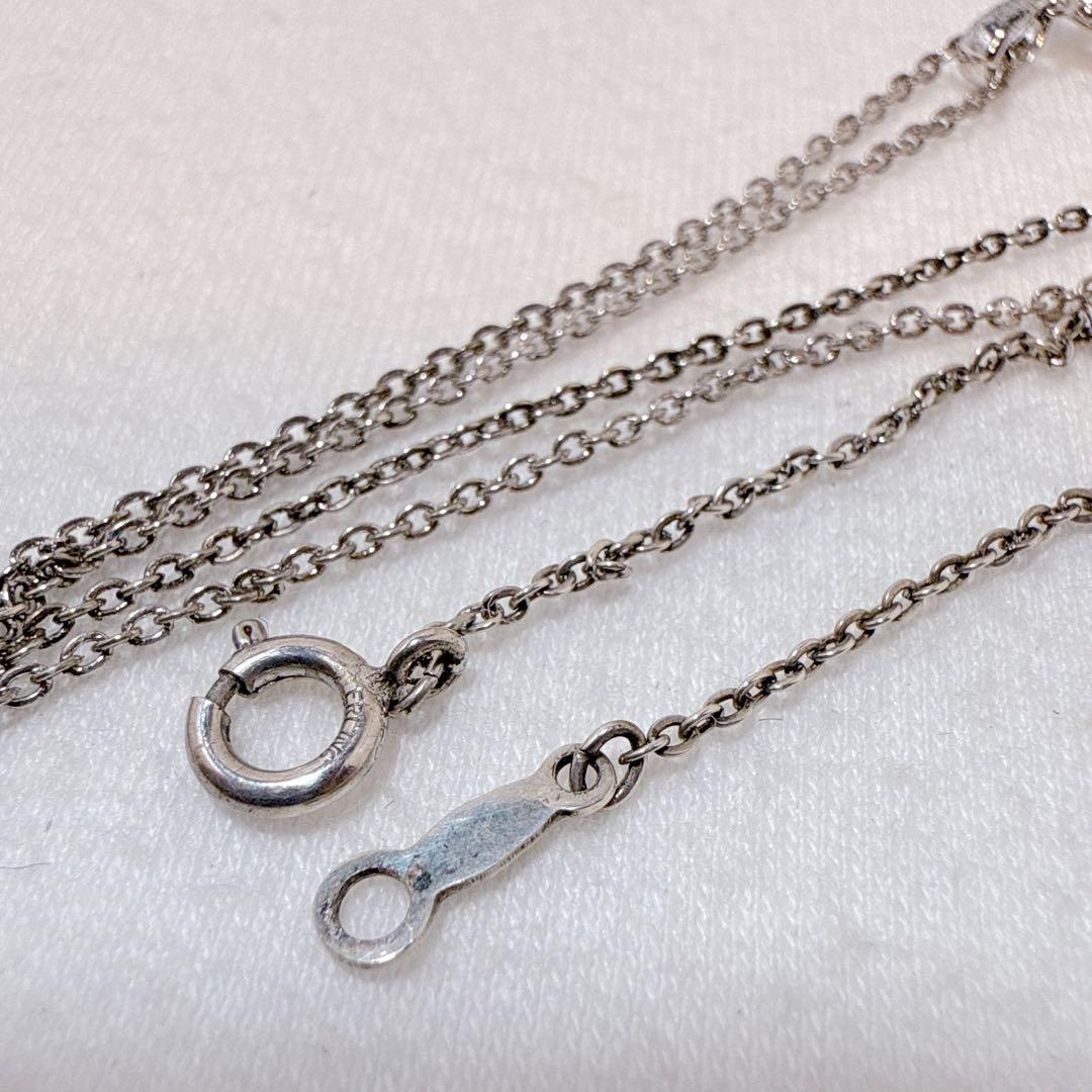 MIKIMOTO Silver necklace with one round Akoya pearl bead and 41 cm chain displayed on white background
