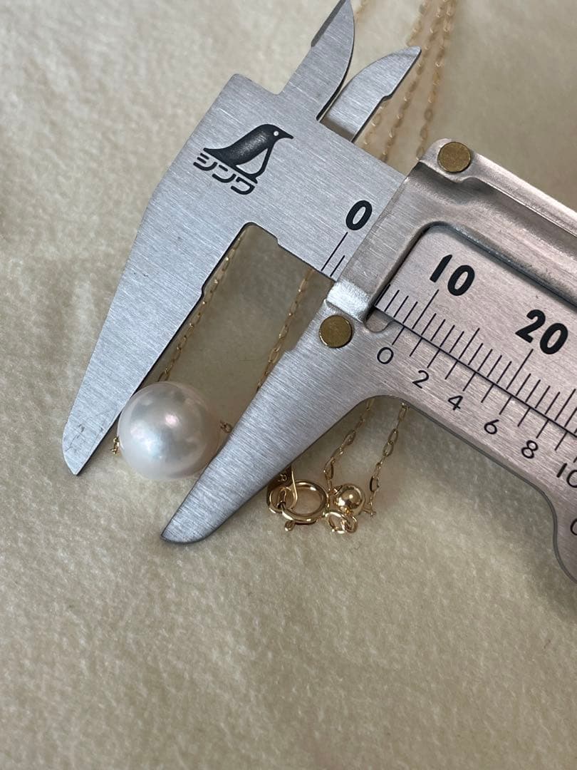 K18 yellow gold necklace featuring 9mm flower pearl Akoya pearls on a 45cm chain