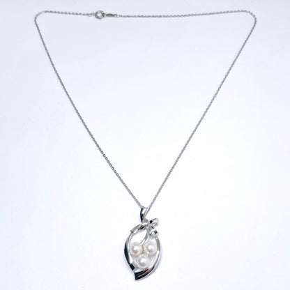 Mikimoto pearl necklace ribbon with 6.1-6.5mm pearls on silver chain, 40cm length