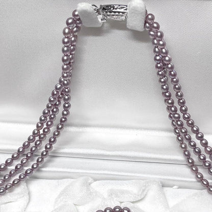 TASAKI baby pearl necklace with rare purple natural pearls, three strands, displayed with box