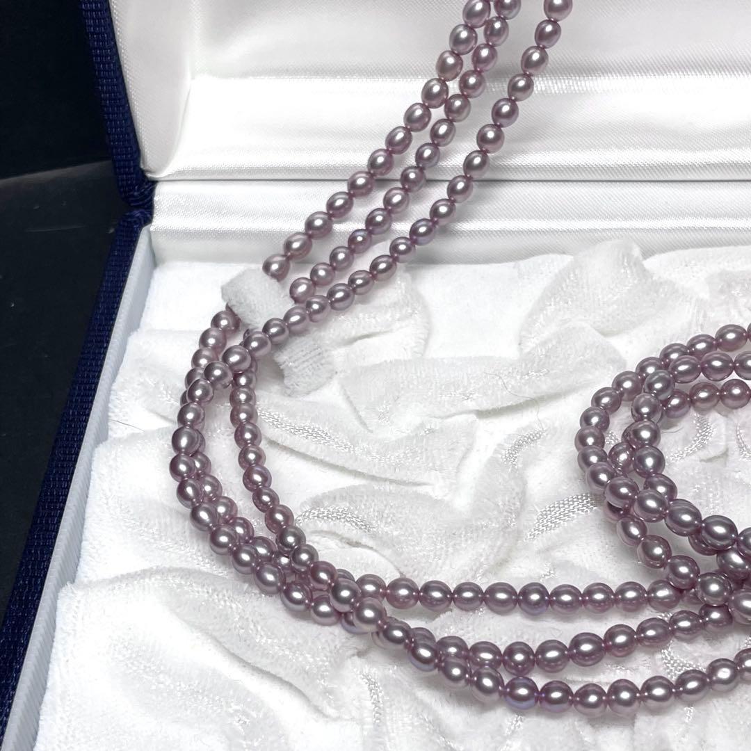 TASAKI baby pearl necklace with rare purple natural pearls, three strands, displayed with box