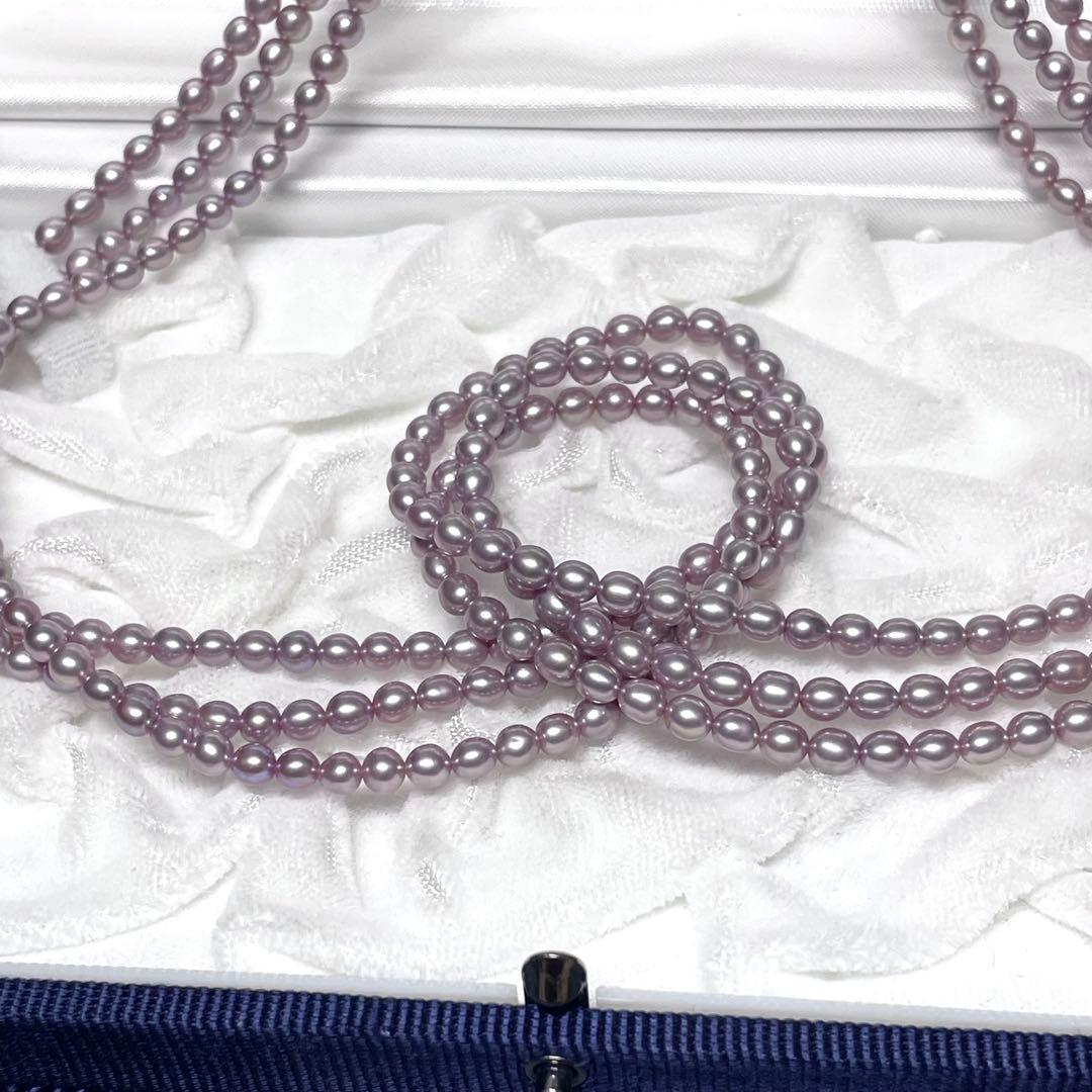 TASAKI baby pearl necklace with rare purple natural pearls, three strands, displayed with box