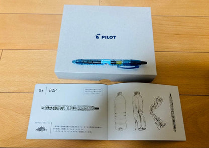 Five-piece set of Pilot pens including leaflet for each writing instrument on a white background