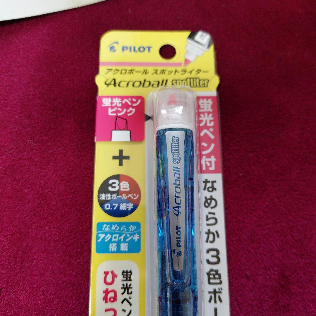 Pilot Acroball Spotliter multicolor ballpoint pen with fluorescent yellow refill on white background