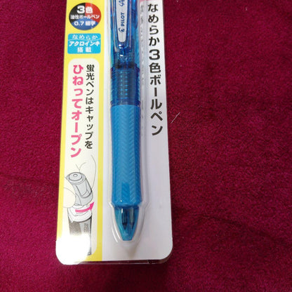 Pilot Acroball Spotliter multicolor ballpoint pen with fluorescent yellow refill on white background