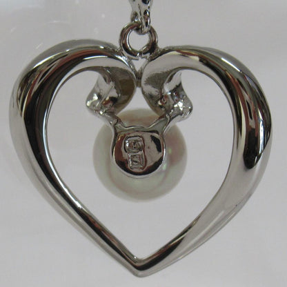 MIKIMOTO Pearl Silver Necklace 22 with single 6mm pearl on 40cm silver chain and engraved markings