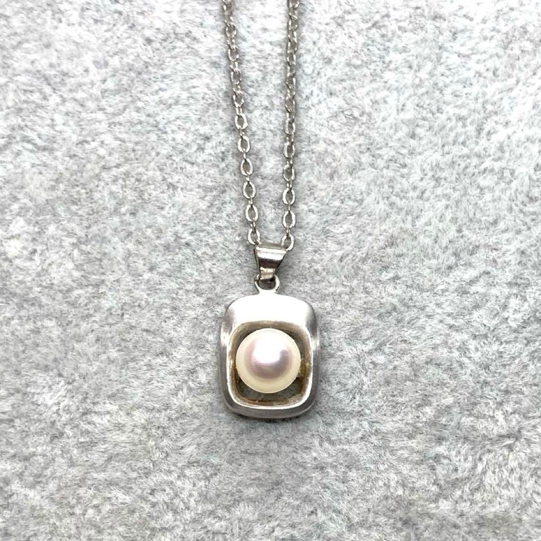 Akoya pearl necklace with 6.3mm white pearls and silver mark pendant on 41cm chain
