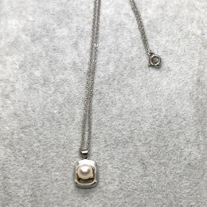 Akoya pearl necklace with 6.3mm white pearls and silver mark pendant on 41cm chain