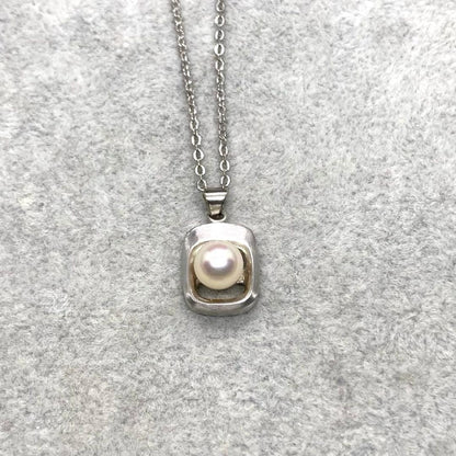 Akoya pearl necklace with 6.3mm white pearls and silver mark pendant on 41cm chain