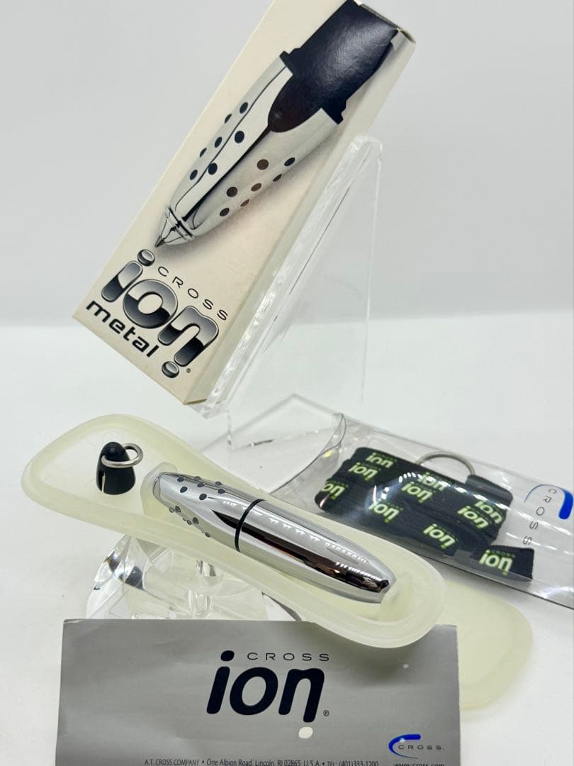 CROSS ion Kuro silver rollerball pen with glossy body, shown with original case and packaging