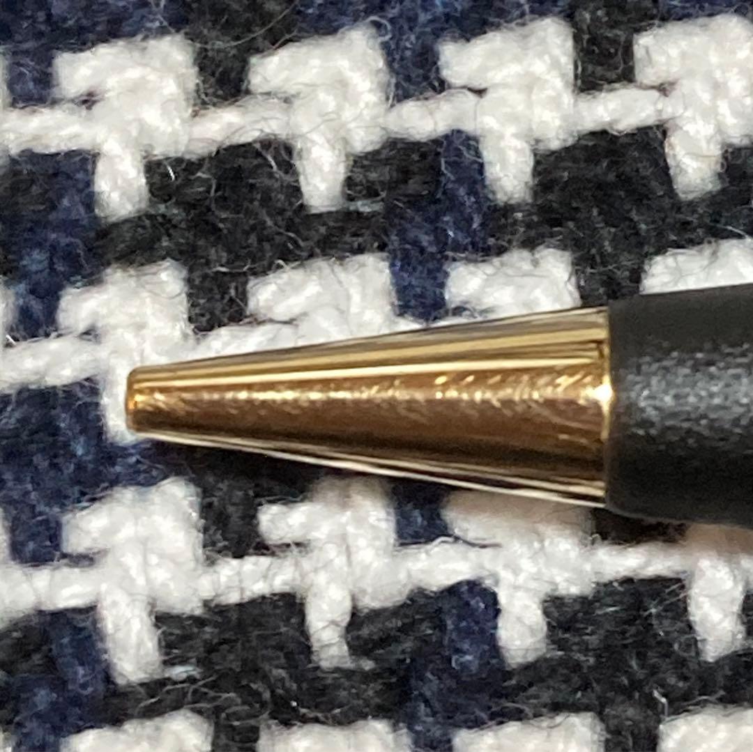 Cross mechanical pencil with wine-colored pen holder and 23 lead refills displayed