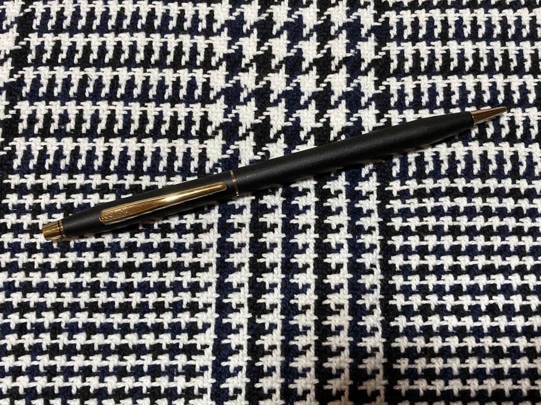 Cross mechanical pencil with wine-colored pen holder and 23 lead refills displayed