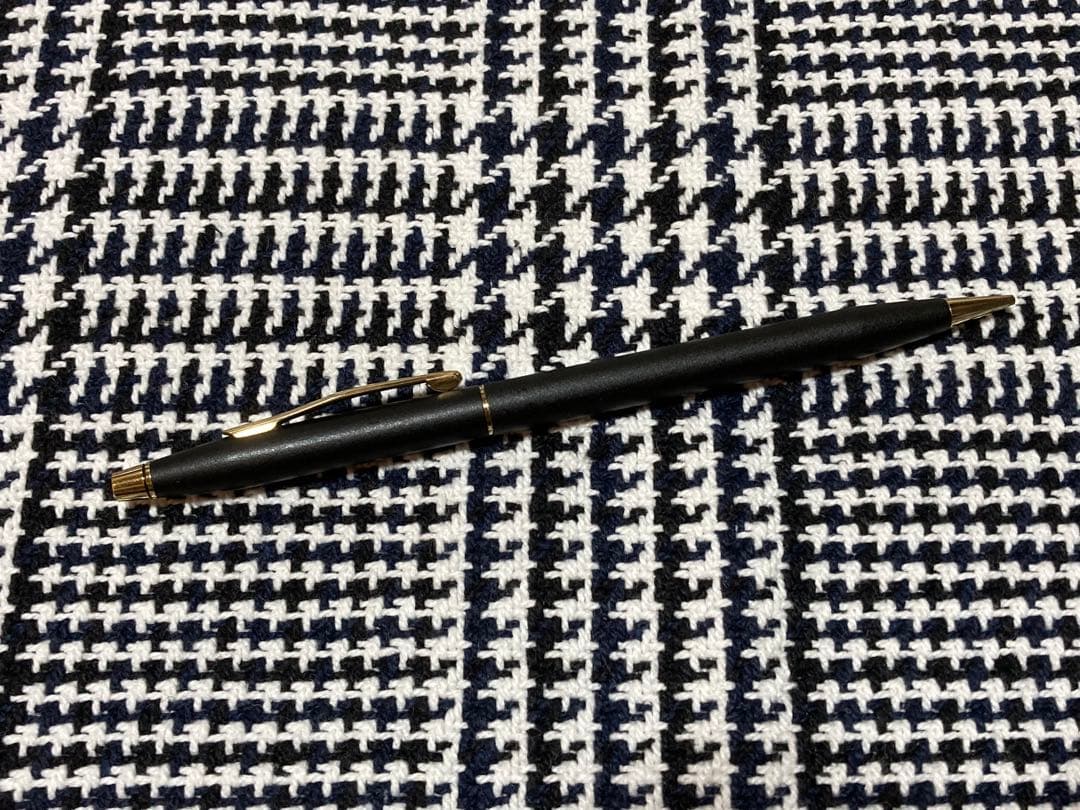 Cross mechanical pencil with wine-colored pen holder and 23 lead refills displayed