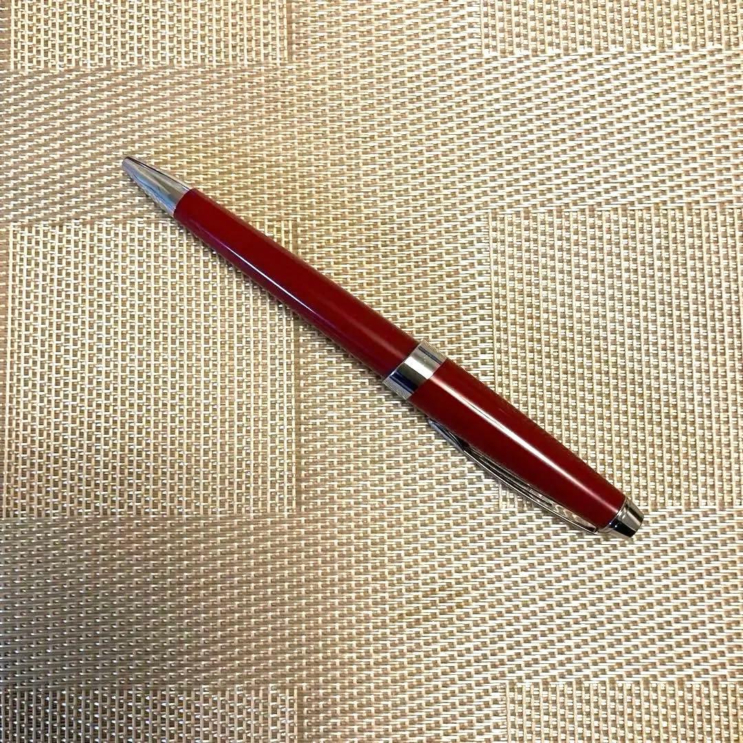 Cross ballpoint pen twist type in shiny Aventurared body, 57mm length, shown on white background