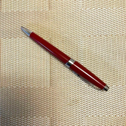 Cross ballpoint pen twist type in shiny Aventurared body, 57mm length, shown on white background