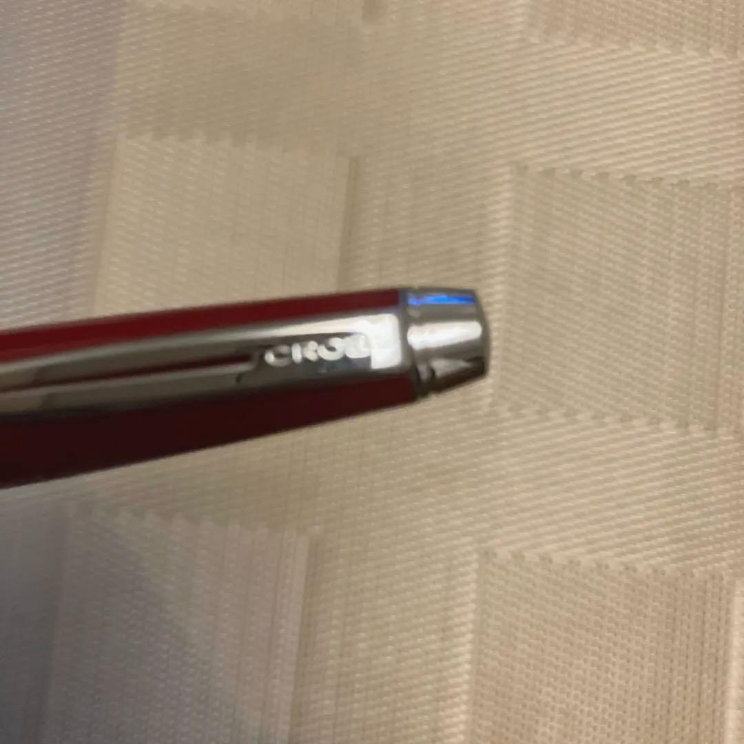 Cross ballpoint pen twist type in shiny Aventurared body, 57mm length, shown on white background