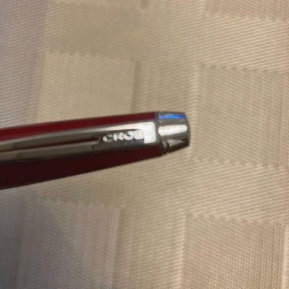 Cross ballpoint pen twist type in shiny Aventurared body, 57mm length, shown on white background