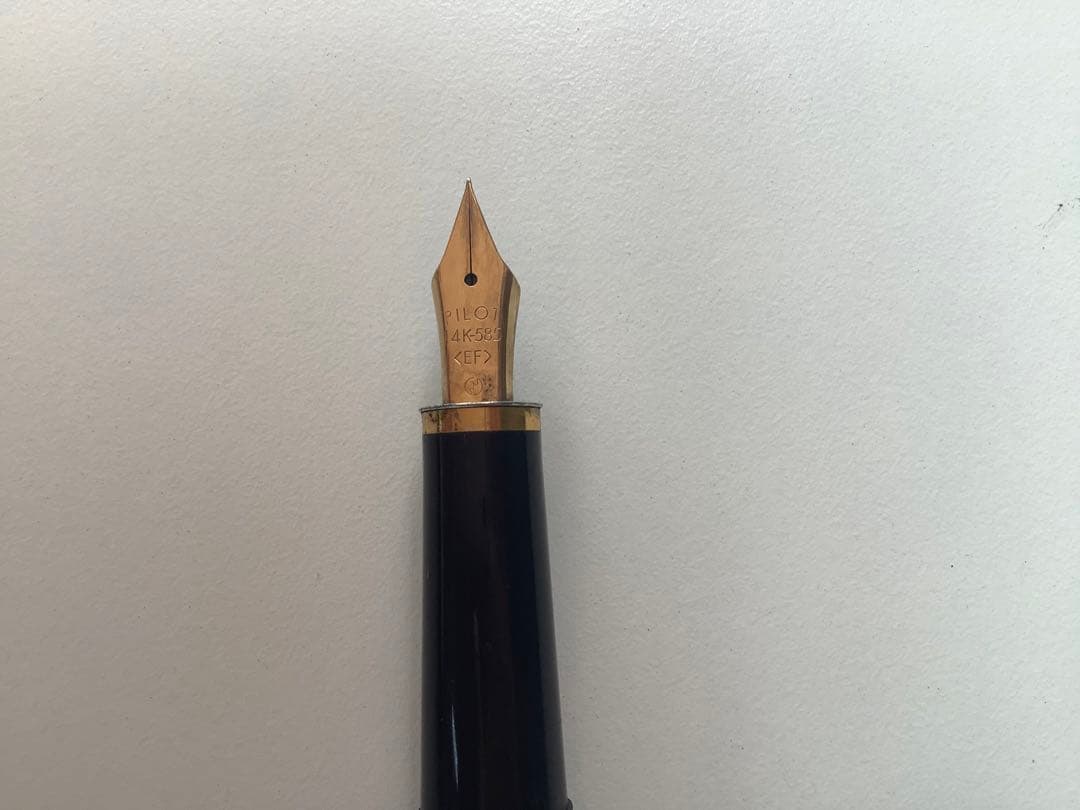 Used PILOT fountain pen with 14K gold nib showing minor scratches and no visible damage