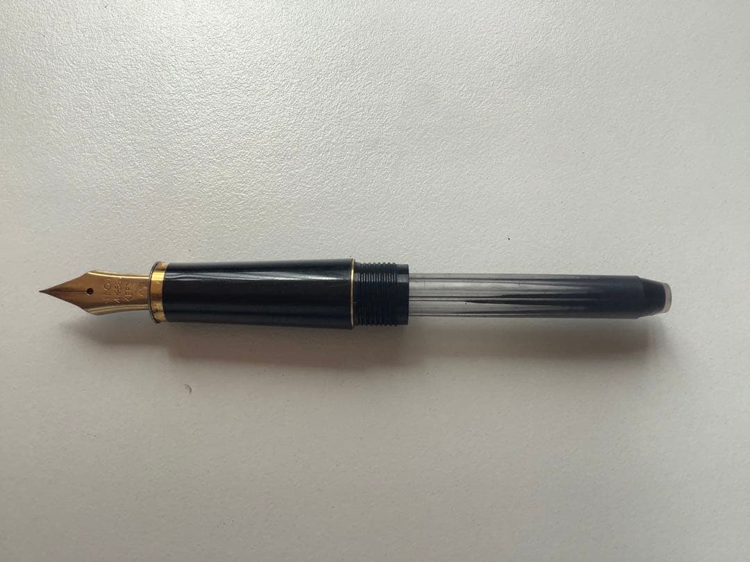 Used PILOT fountain pen with 14K gold nib showing minor scratches and no visible damage