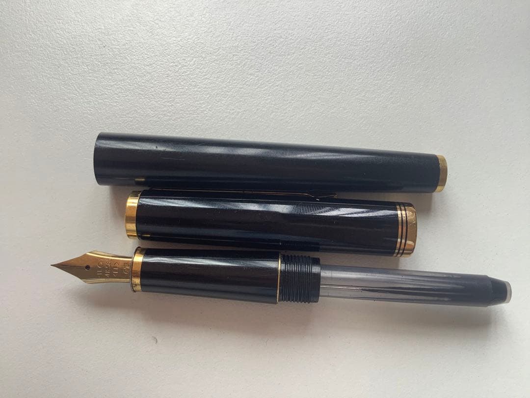 Used PILOT fountain pen with 14K gold nib showing minor scratches and no visible damage