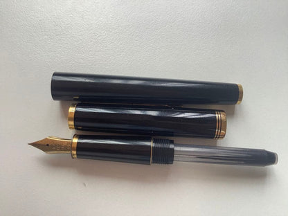 Used PILOT fountain pen with 14K gold nib showing minor scratches and no visible damage