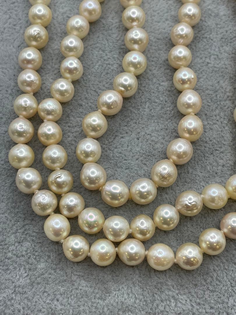 Long Akoya pearl necklace with 7mm genuine pearls on a silver chain measuring 80 cm