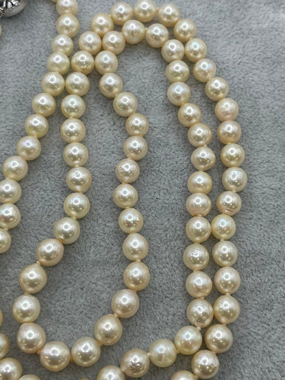 Long Akoya pearl necklace with 7mm genuine pearls on a silver chain measuring 80 cm