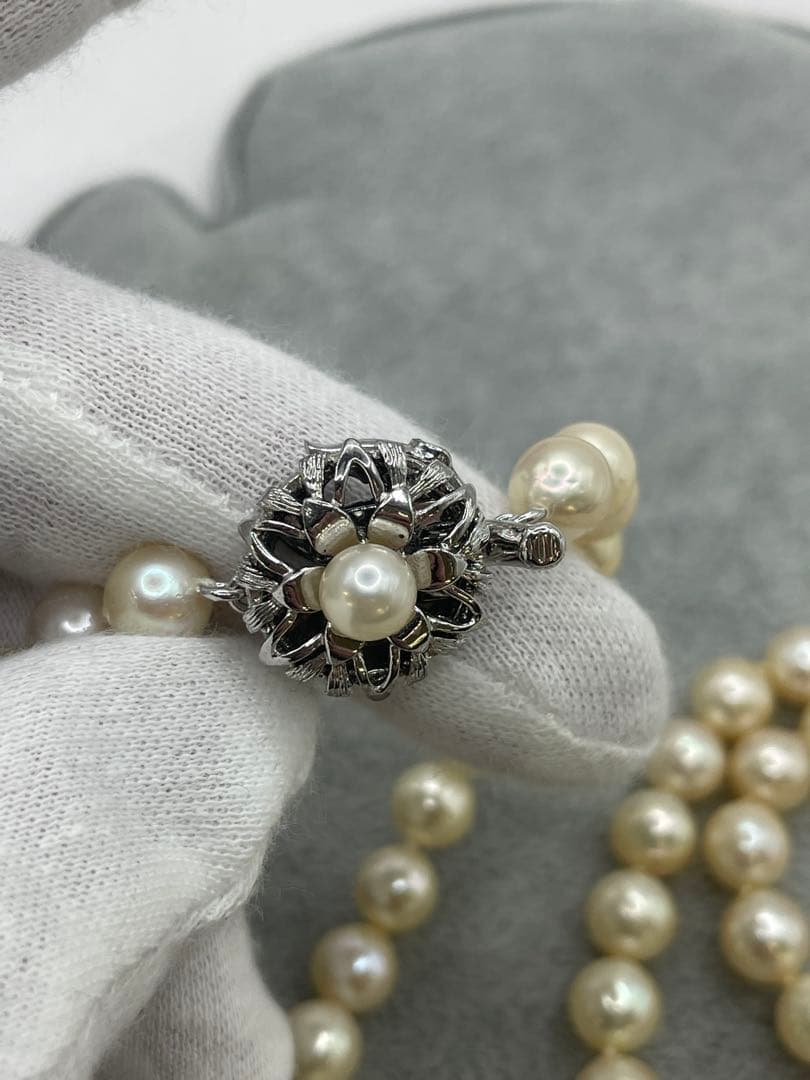 Long Akoya pearl necklace with 7mm genuine pearls on a silver chain measuring 80 cm