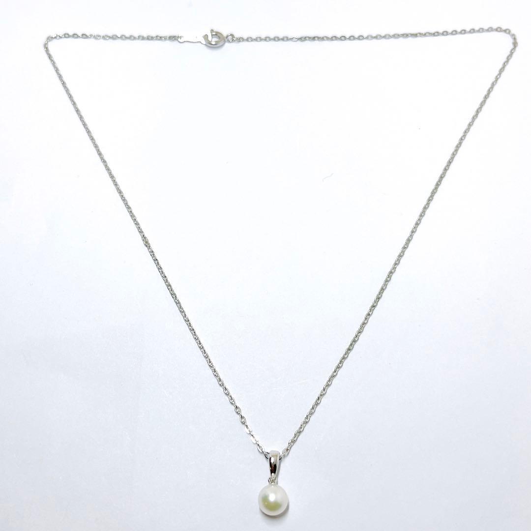 MIKIMOTO pearl necklace pendant with a single 6.4mm pearl on a silver chain, 40.5mm length