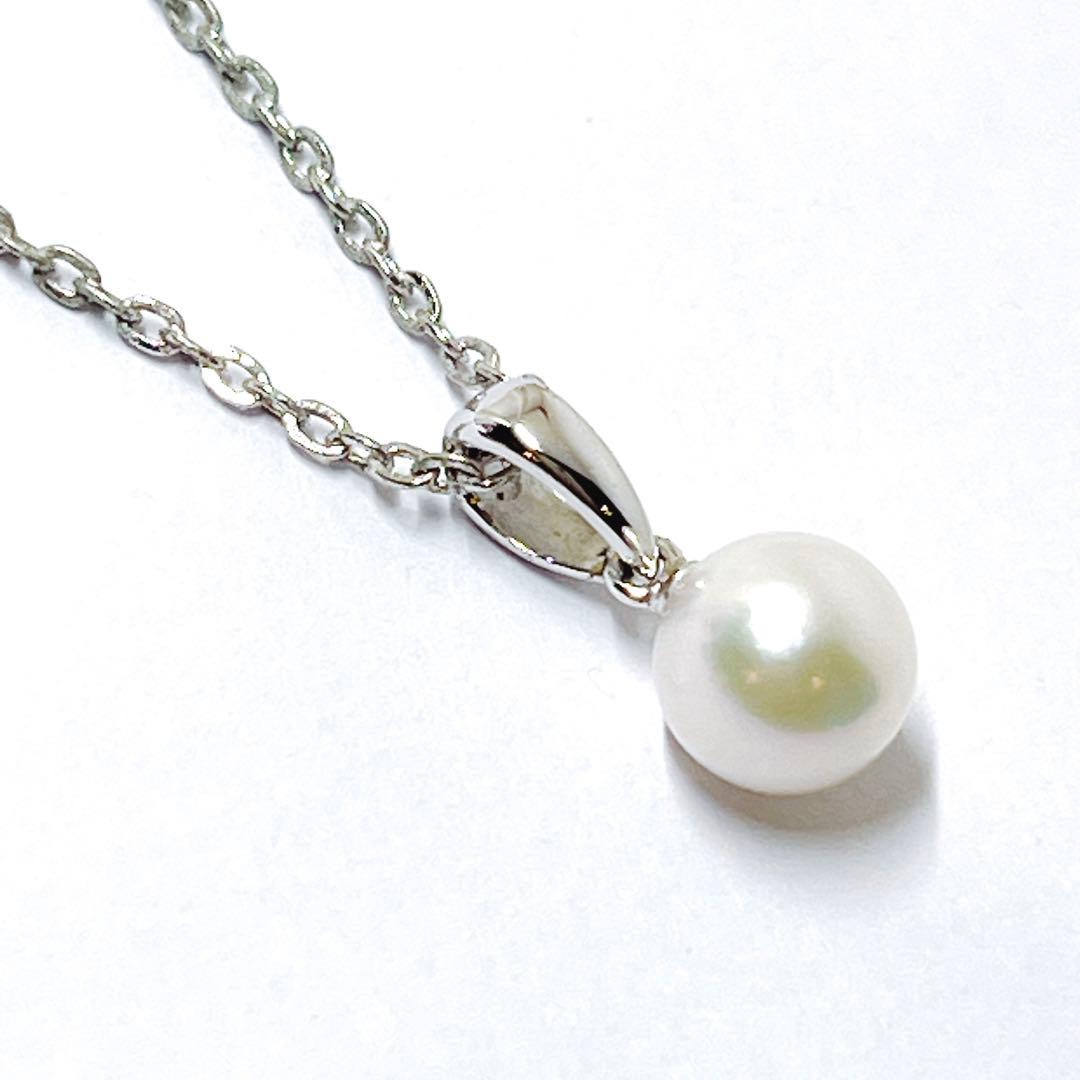 MIKIMOTO pearl necklace pendant with a single 6.4mm pearl on a silver chain, 40.5mm length