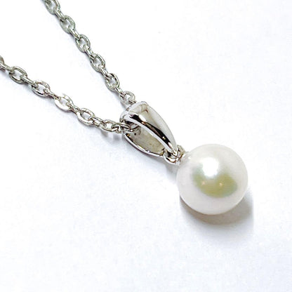 MIKIMOTO pearl necklace pendant with a single 6.4mm pearl on a silver chain, 40.5mm length