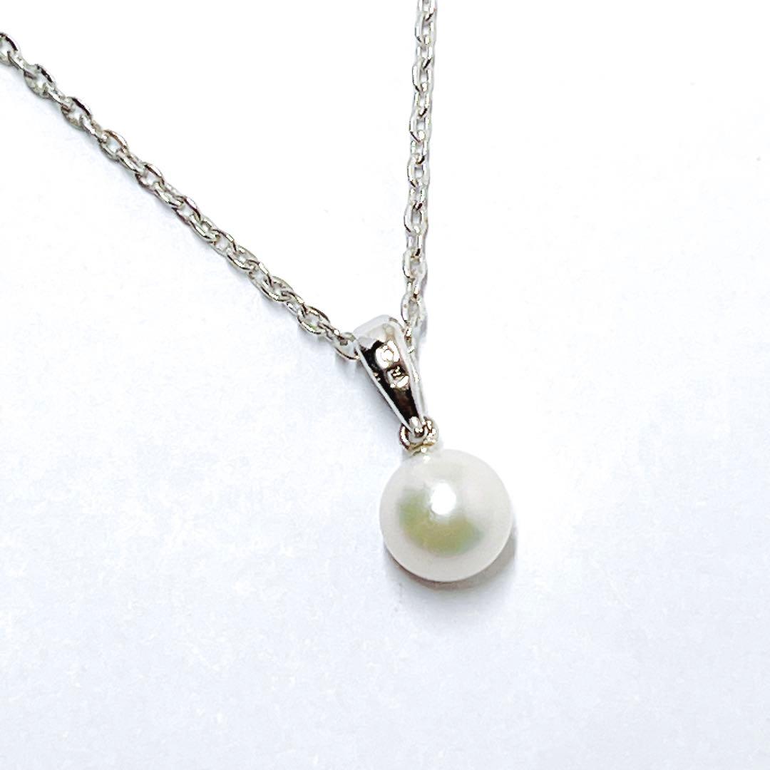 MIKIMOTO pearl necklace pendant with a single 6.4mm pearl on a silver chain, 40.5mm length