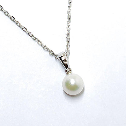 MIKIMOTO pearl necklace pendant with a single 6.4mm pearl on a silver chain, 40.5mm length