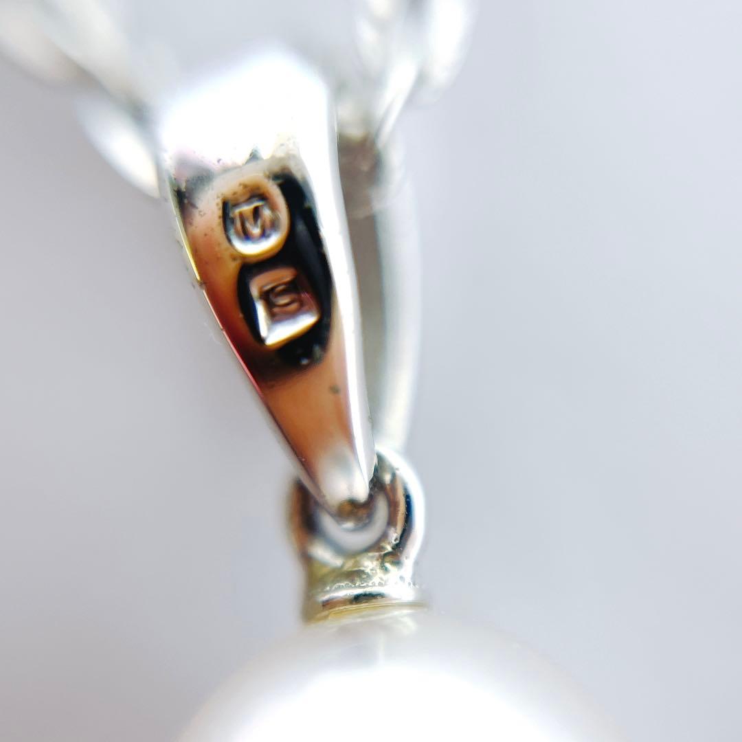 MIKIMOTO pearl necklace pendant with a single 6.4mm pearl on a silver chain, 40.5mm length