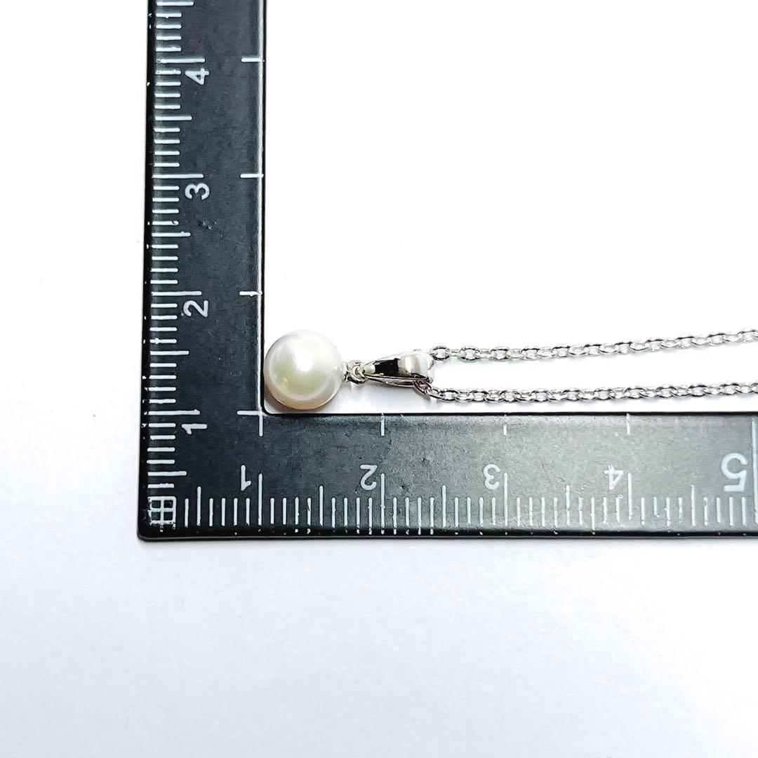 MIKIMOTO pearl necklace pendant with a single 6.4mm pearl on a silver chain, 40.5mm length