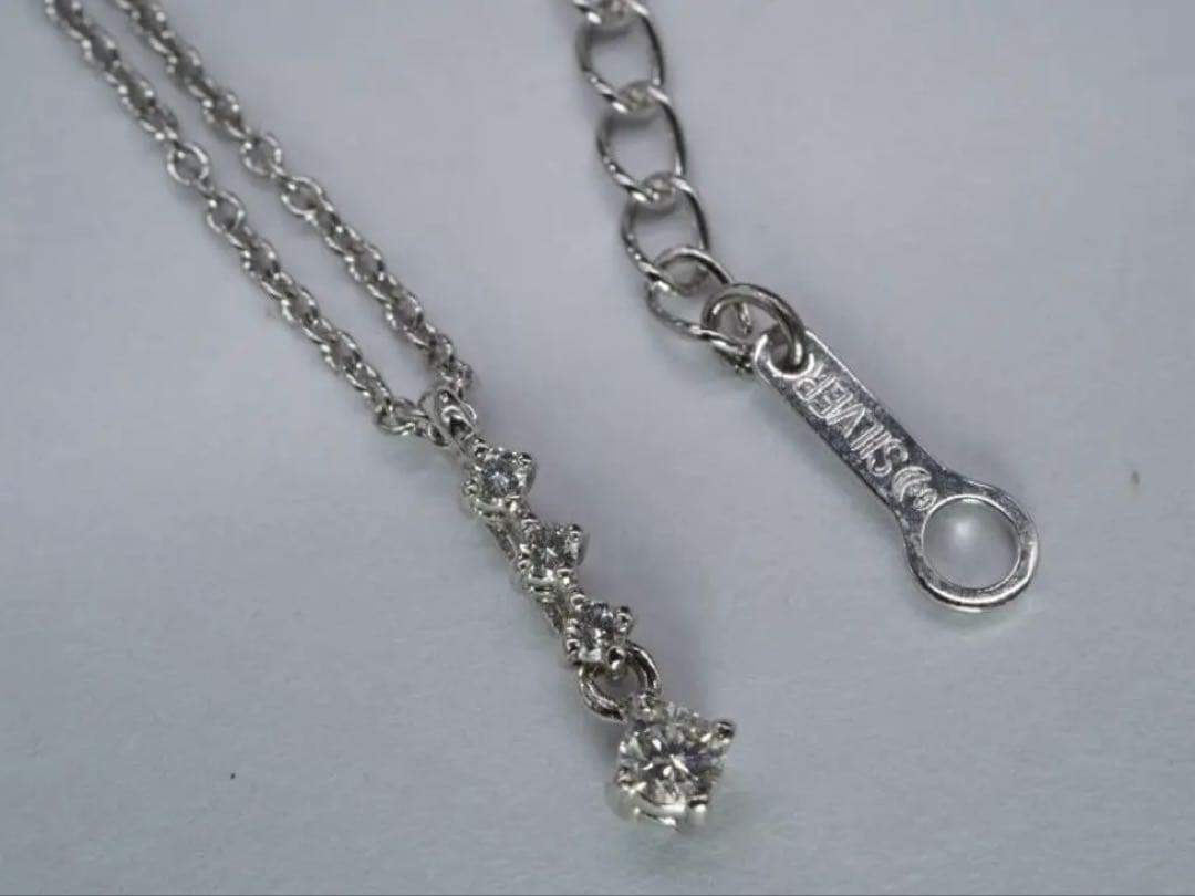 Tasaki pearl diamond silver necklace with 38 cm length, 3.5 cm adjuster, and diamond pendant at the tip