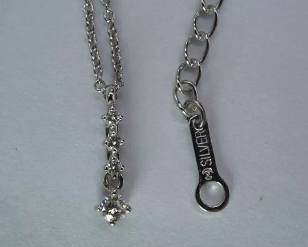 Tasaki pearl diamond silver necklace with 38 cm length, 3.5 cm adjuster, and diamond pendant at the tip