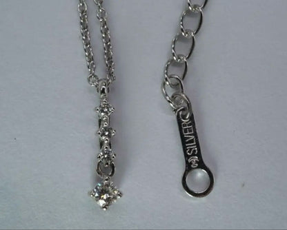 Tasaki pearl diamond silver necklace with 38 cm length, 3.5 cm adjuster, and diamond pendant at the tip