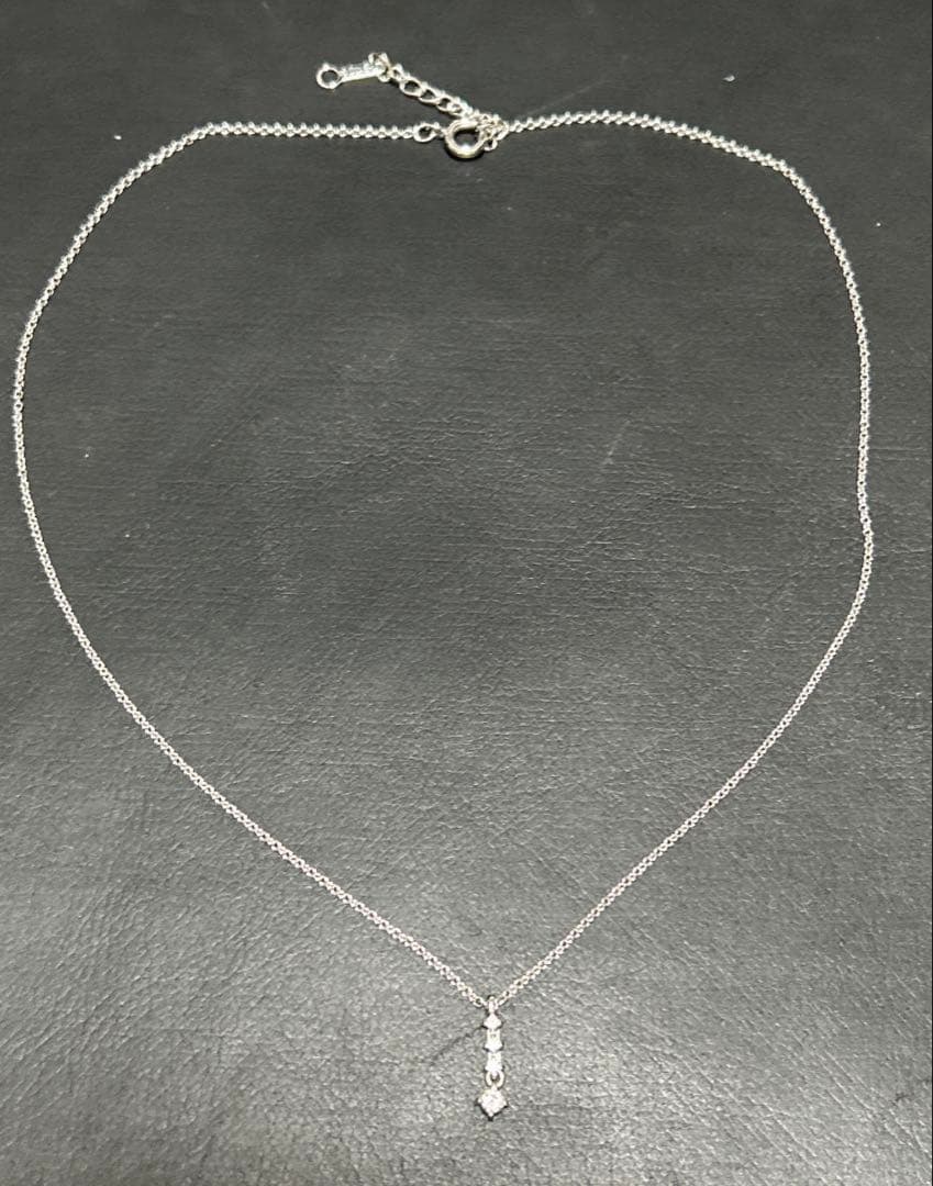 Tasaki pearl diamond silver necklace with 38 cm length, 3.5 cm adjuster, and diamond pendant at the tip