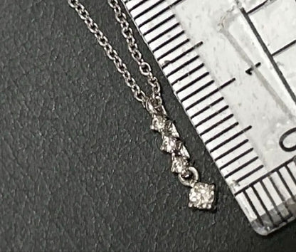 Tasaki pearl diamond silver necklace with 38 cm length, 3.5 cm adjuster, and diamond pendant at the tip