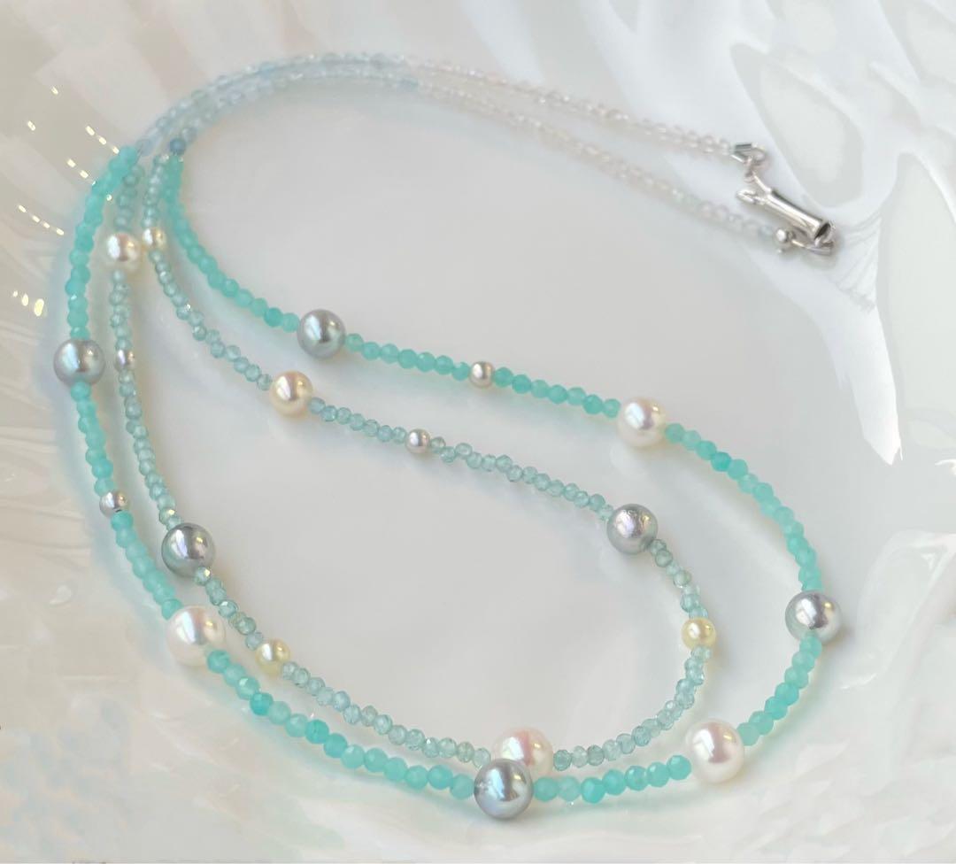 Akoya pearl layered necklace with 19 pearls in sea and sky colors showcasing transparency and unique design
