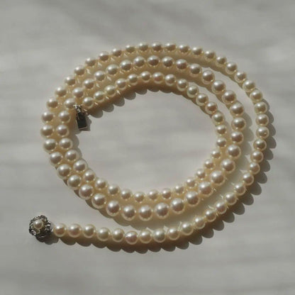 Akoya pearl necklace with genuine ivory pearls sized 8.6-7.0mm, 82cm long with clasp