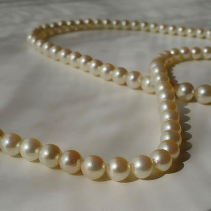 Akoya pearl necklace with genuine ivory pearls sized 8.6-7.0mm, 82cm long with clasp