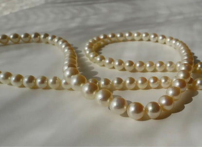Akoya pearl necklace with genuine ivory pearls sized 8.6-7.0mm, 82cm long with clasp