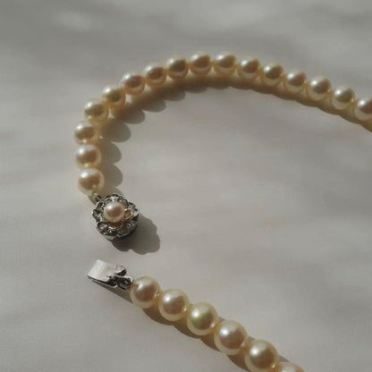 Akoya pearl necklace with genuine ivory pearls sized 8.6-7.0mm, 82cm long with clasp