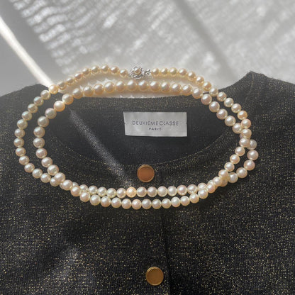 Akoya pearl necklace with genuine ivory pearls sized 8.6-7.0mm, 82cm long with clasp